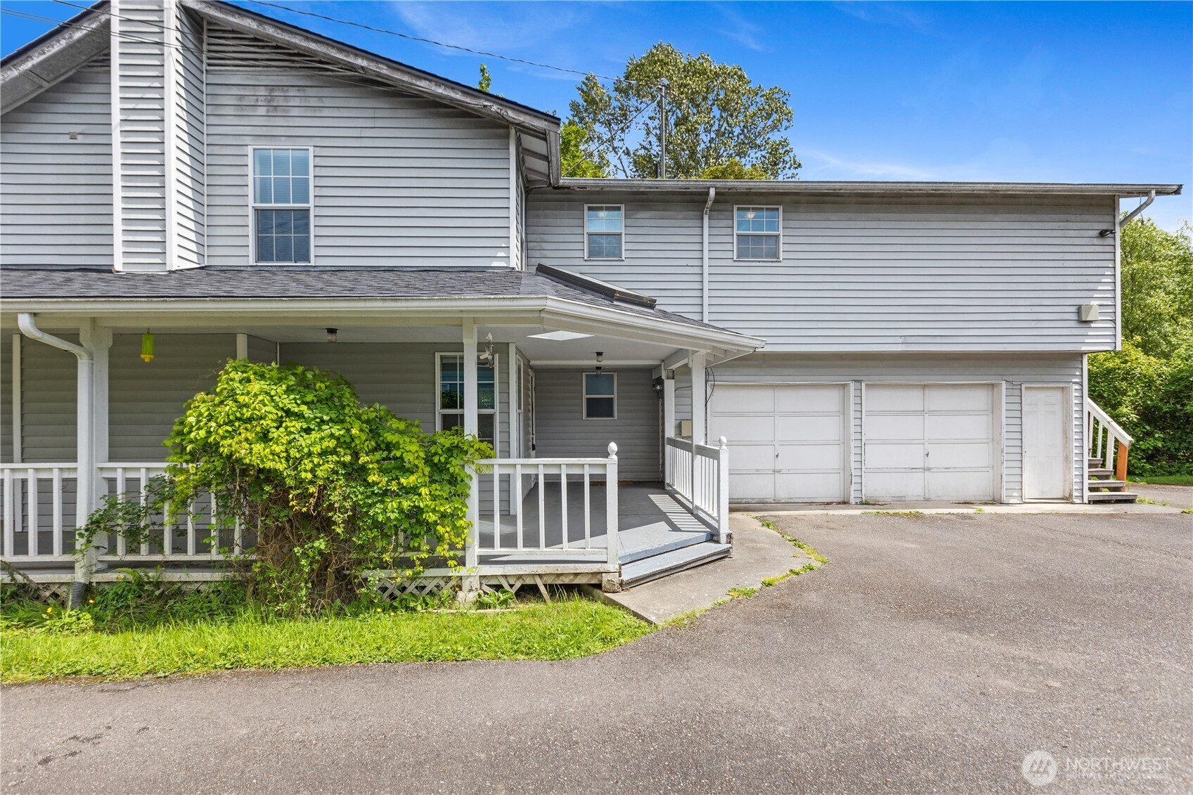 2312 Jade Avenue Everett, WA 98201 - Photo 27 of 34 a front view of a house with a garden and plants