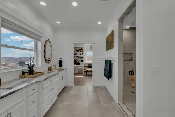 a bathroom with a toilet a sink and a mirror