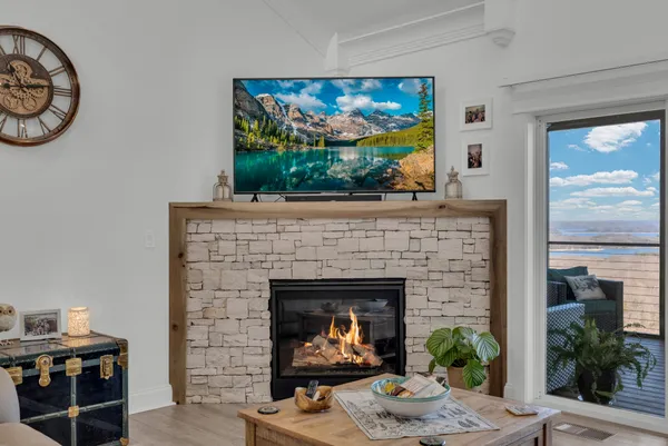 a view of a kitchen with wooden floor