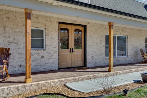 a utility room with sink dryer and washer