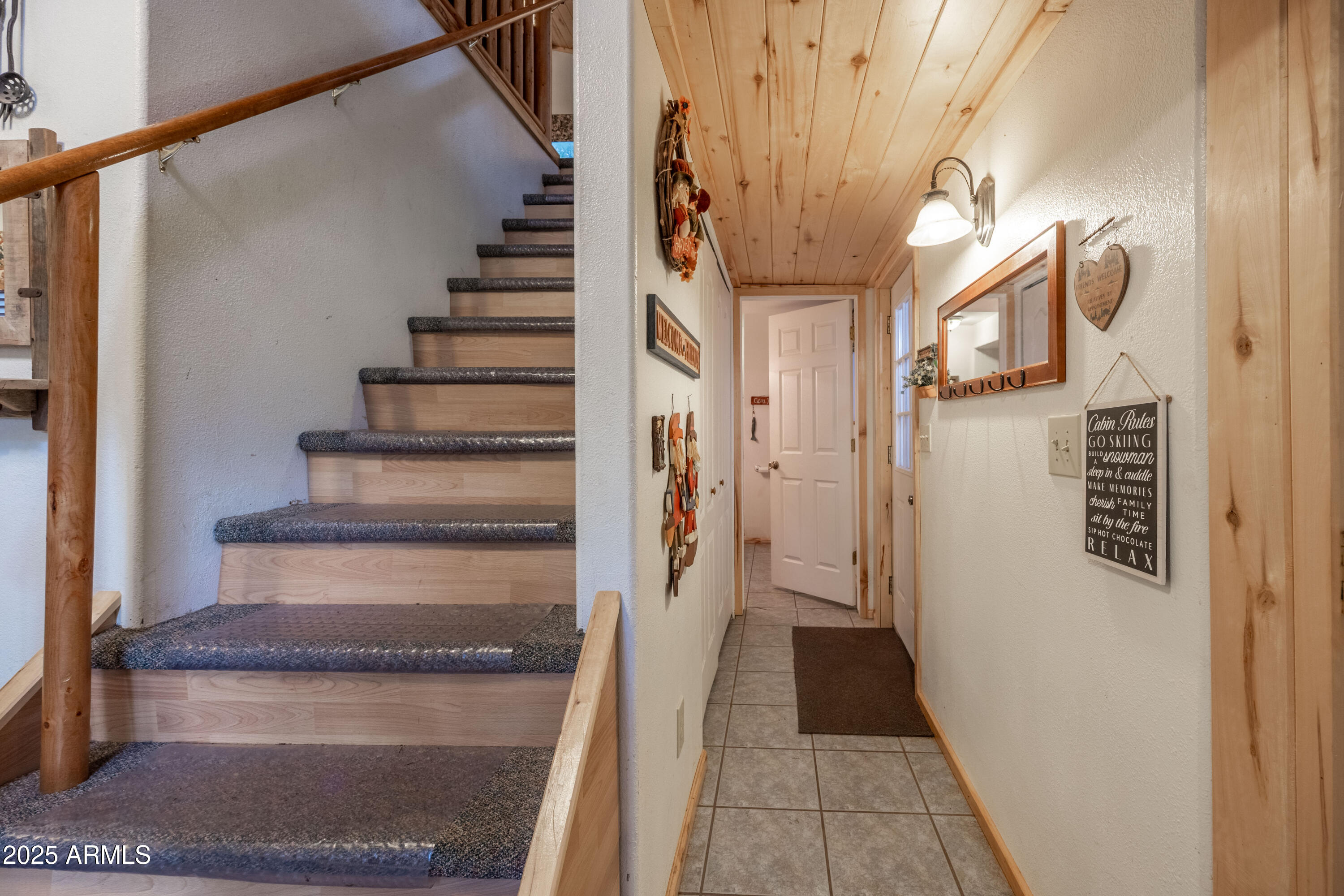 1643 Rifle Way Forest Lakes, AZ 85931 - Photo 17 of 40 a view of entryway and hall with wooden floor