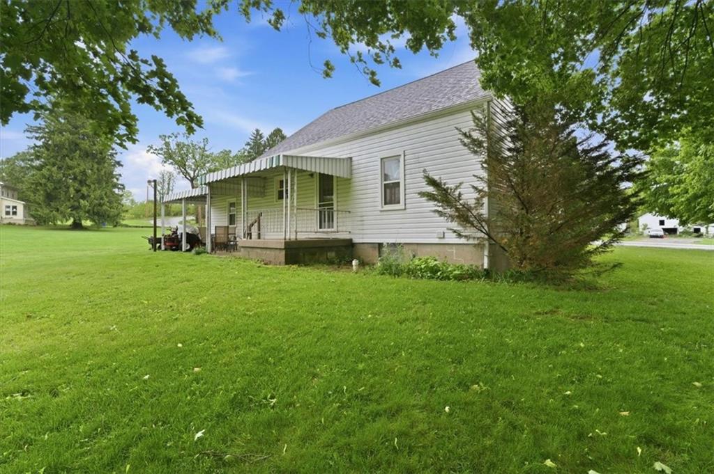 344 Winfield Road Cabot, PA 16023 - Photo 26 of 30 a front view of house with yard and green space