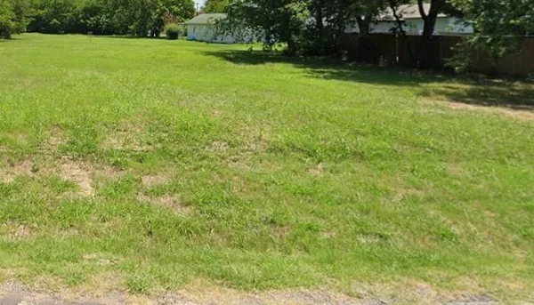 a view of a green yard