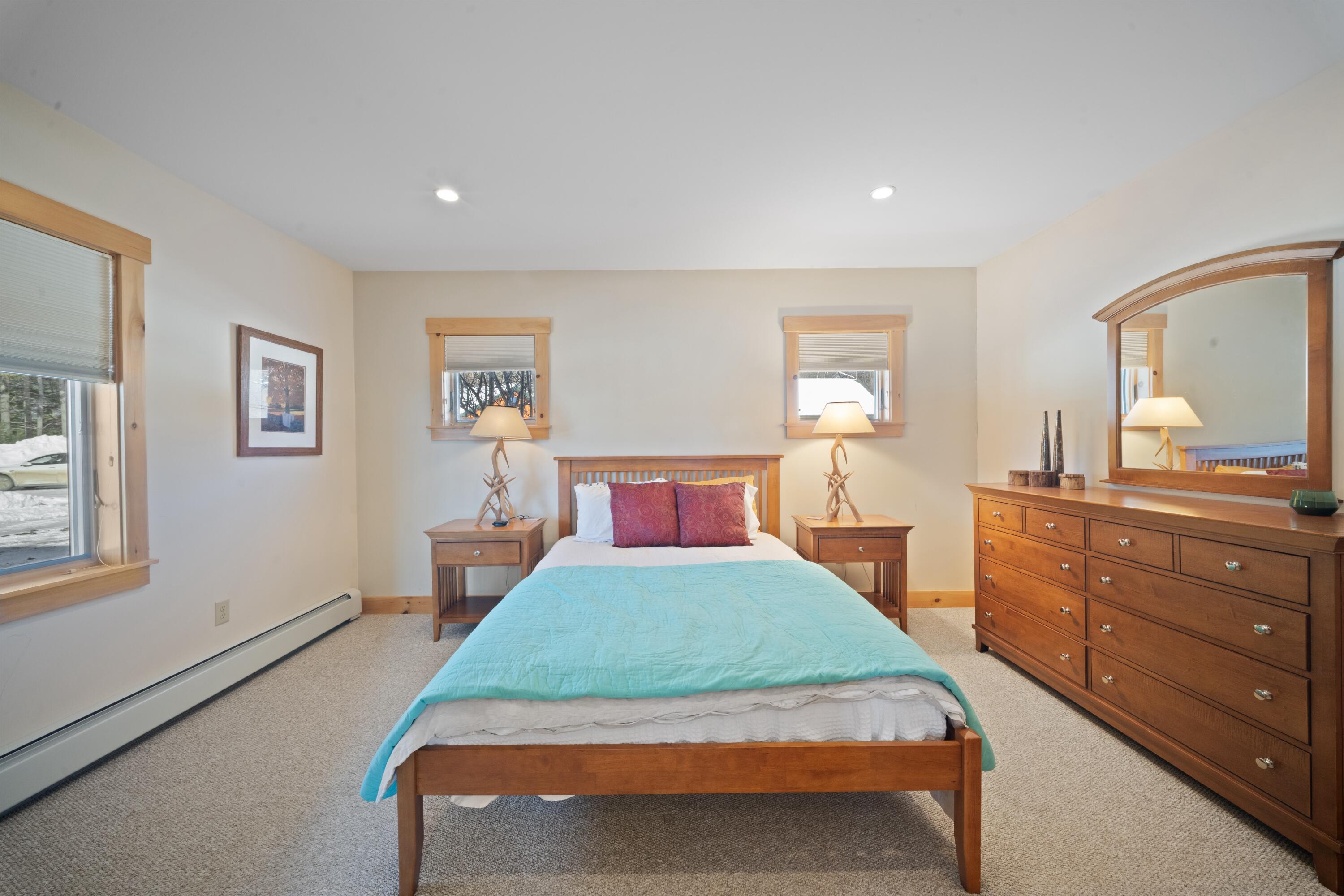 42 Whip Willow Farm Road, Unit 19 Rangeley, ME 04970 - Photo 25 of 52 Primary Bedroom