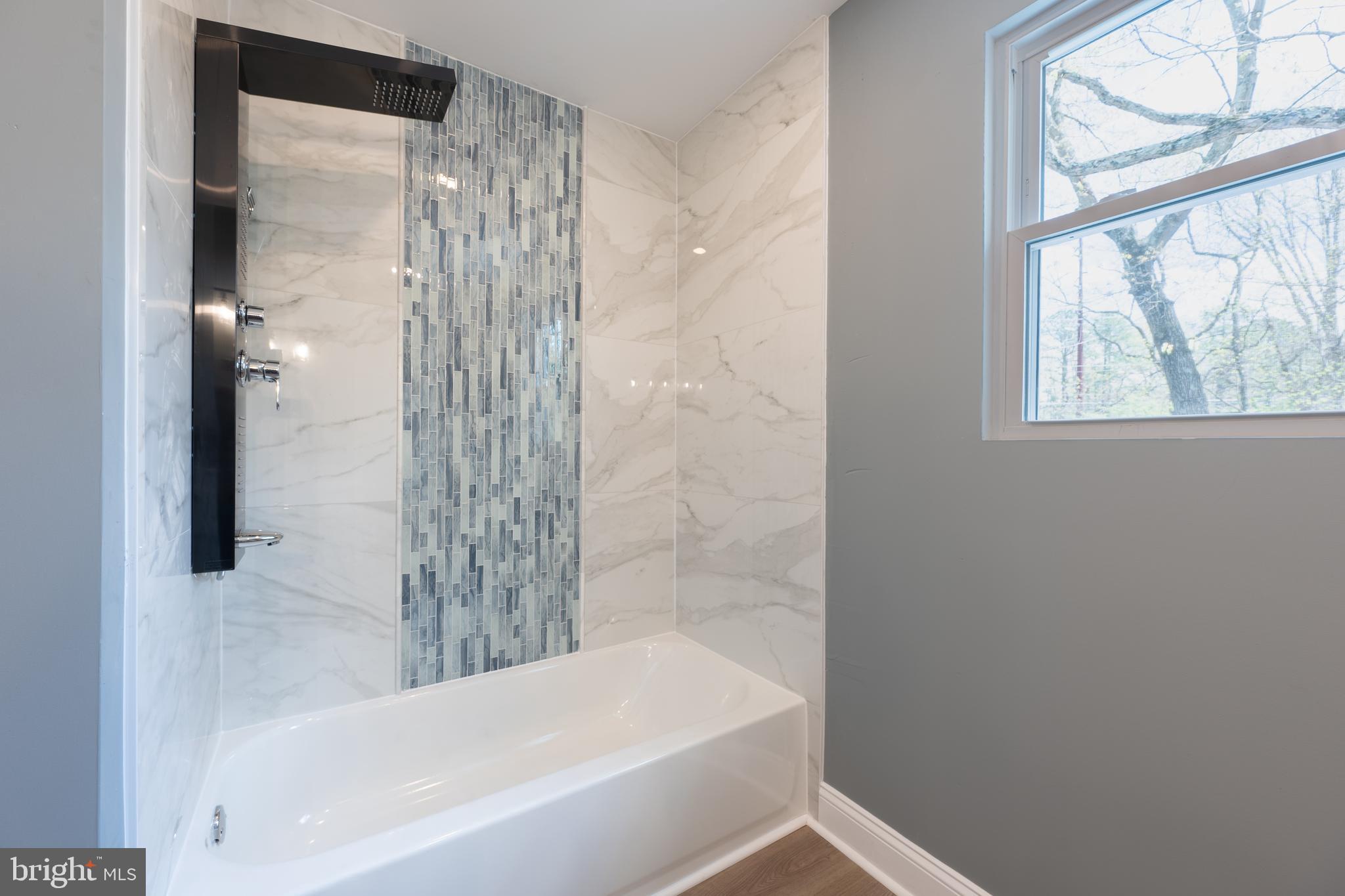 3 Slalom Court Pine Hill, NJ 08021 - Photo 27 of 47 a bathroom with a bathtub and a shower