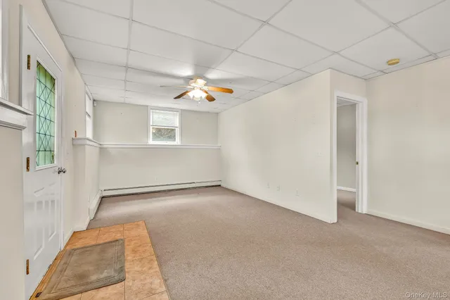 an empty room with windows