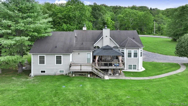 an aerial view of a house with garden