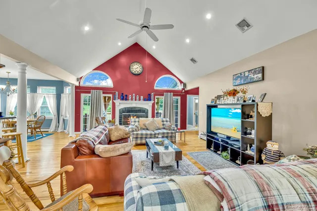 a very nice looking bedroom with furniture and a flat screen tv