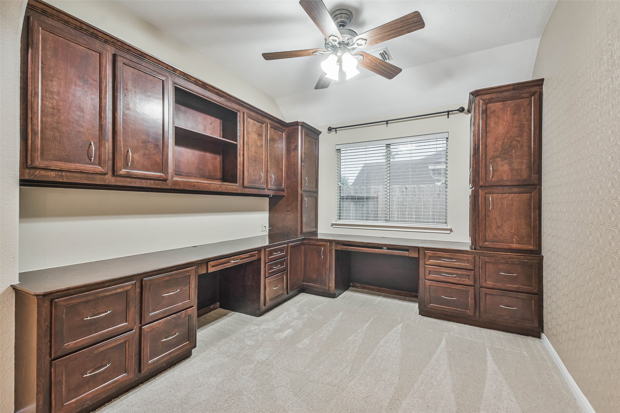 20942 Wind Field Lane Spring, TX 77379 - Photo 26 of 46 a kitchen with stainless steel appliances granite countertop cabinets and window