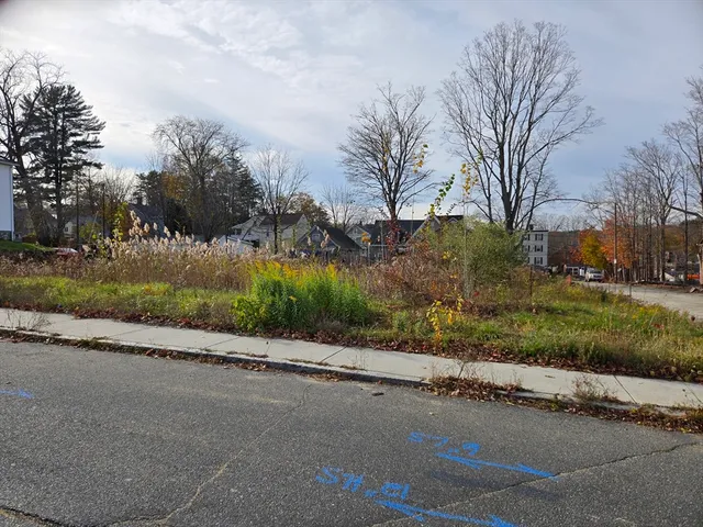 a view of a street both side of a house