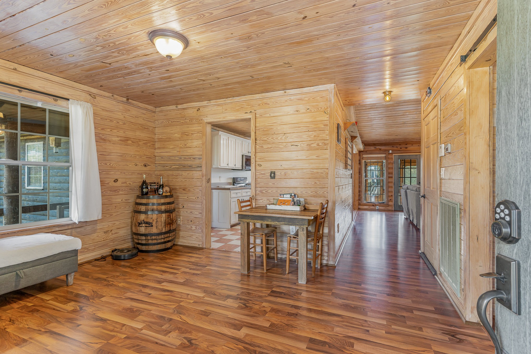 2065 Patterson Cemetery Road Chapel Hill, TN 37034 - Photo 11 of 39 a view of a patio with table and chairs and wooden floor