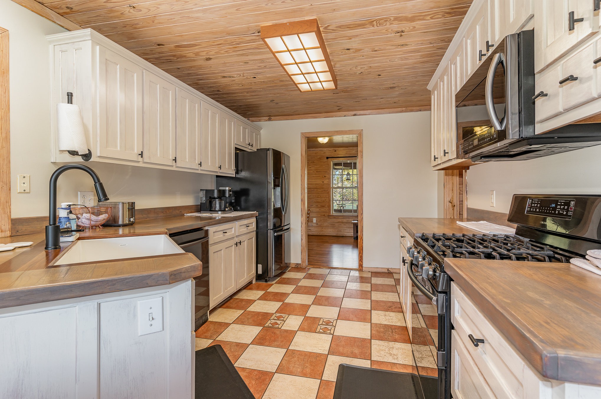 2065 Patterson Cemetery Road Chapel Hill, TN 37034 - Photo 15 of 39 a kitchen with stainless steel appliances granite countertop a stove a sink and a refrigerator