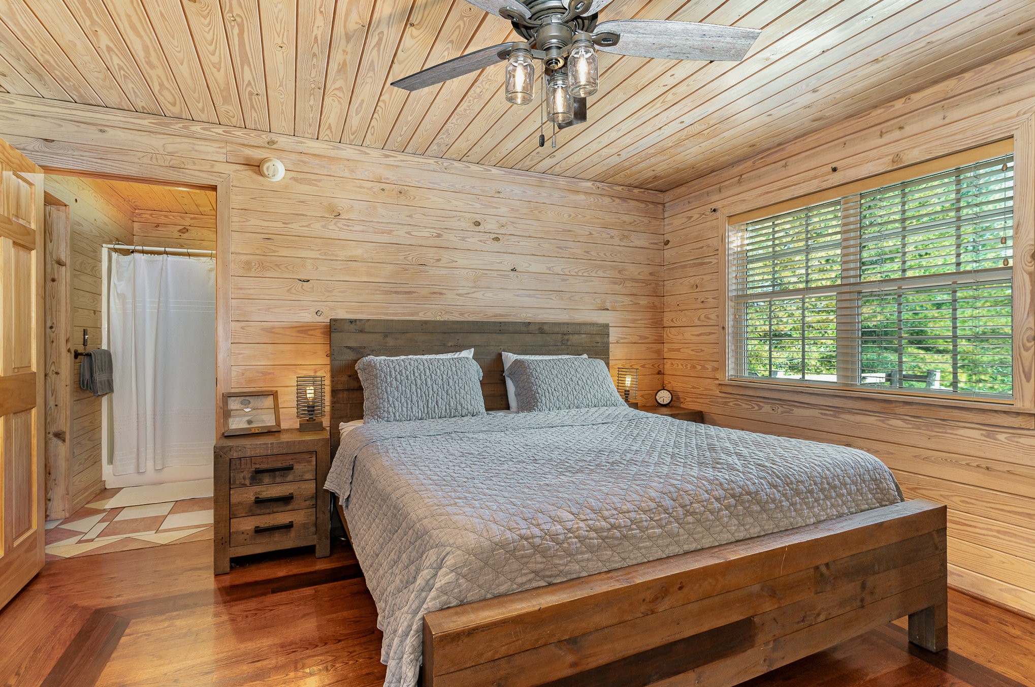 2065 Patterson Cemetery Road Chapel Hill, TN 37034 - Photo 19 of 39 a bed sitting in a bedroom next to a window