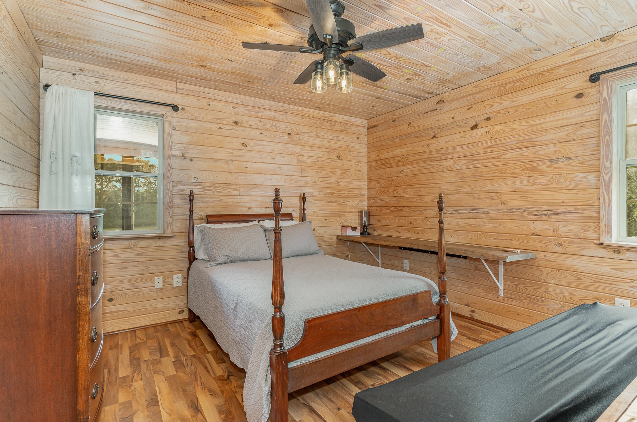 2065 Patterson Cemetery Road Chapel Hill, TN 37034 - Photo 22 of 39 a bedroom with a bed and a ceiling fan