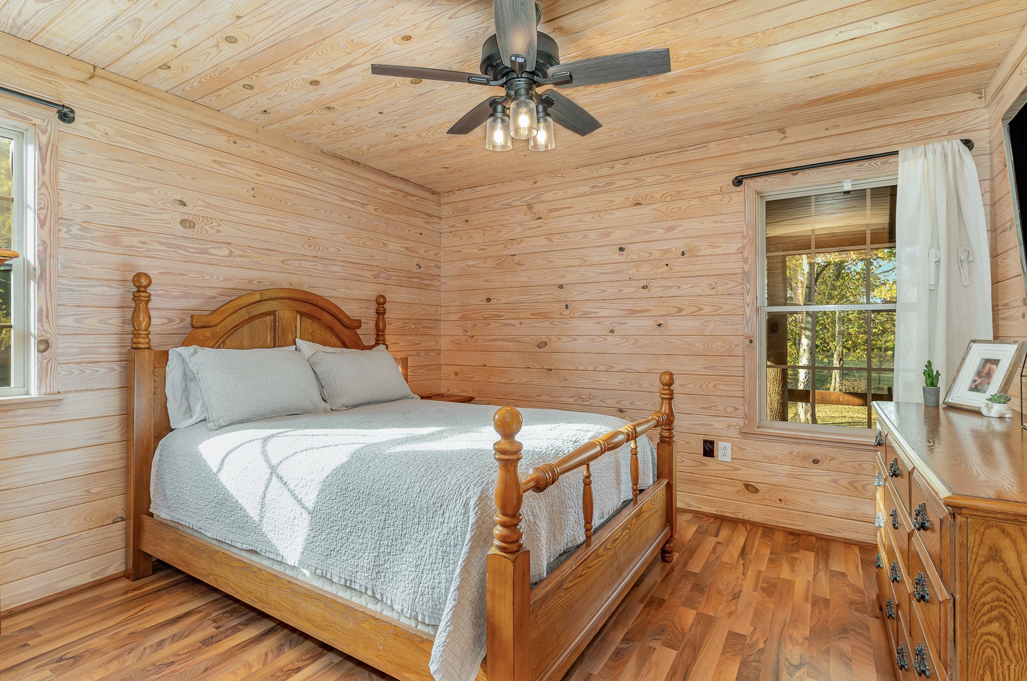 2065 Patterson Cemetery Road Chapel Hill, TN 37034 - Photo 24 of 39 a bedroom with a bed and a chandelier