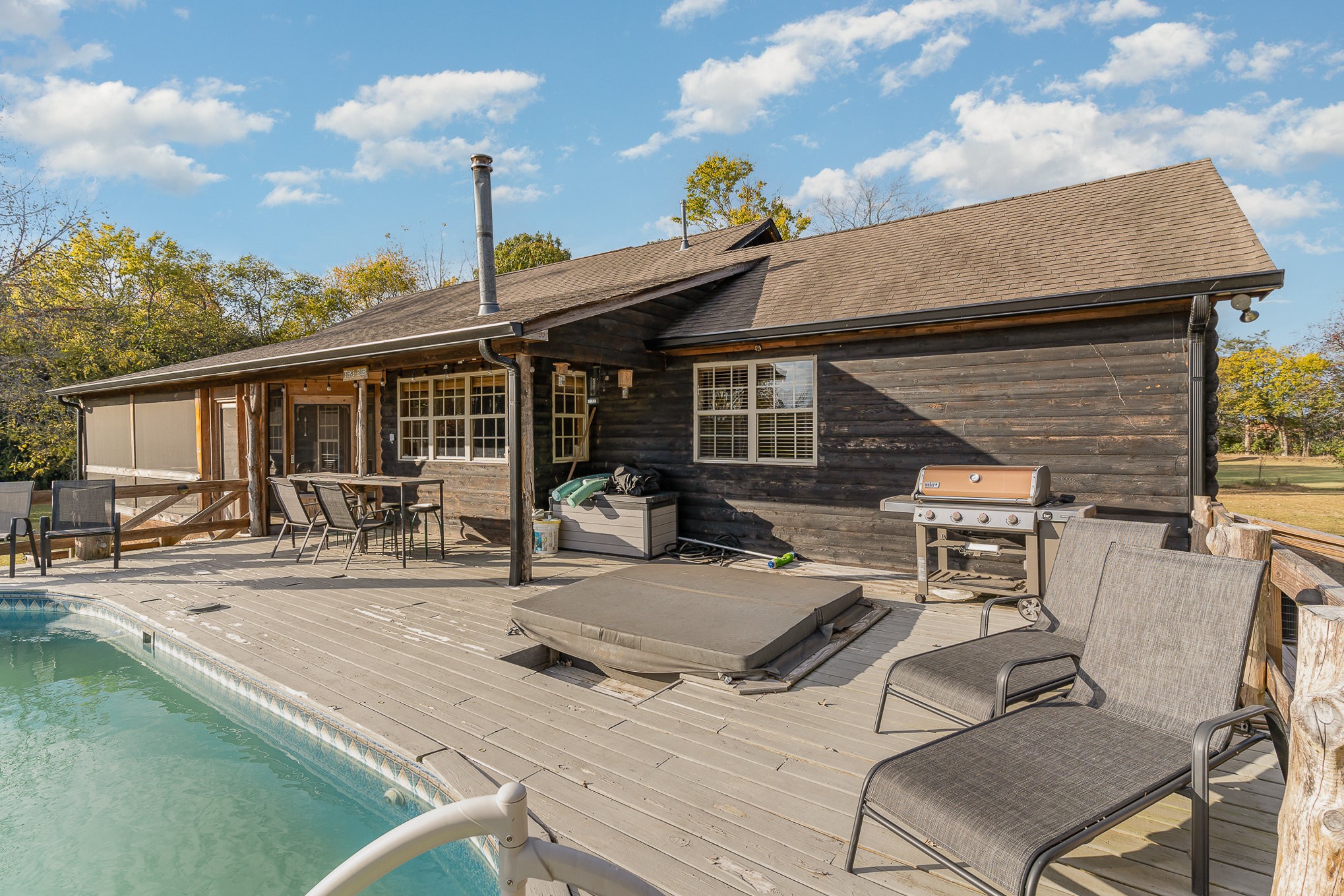 2065 Patterson Cemetery Road Chapel Hill, TN 37034 - Photo 25 of 39 a view of a patio with table and chairs with wooden floor and fence