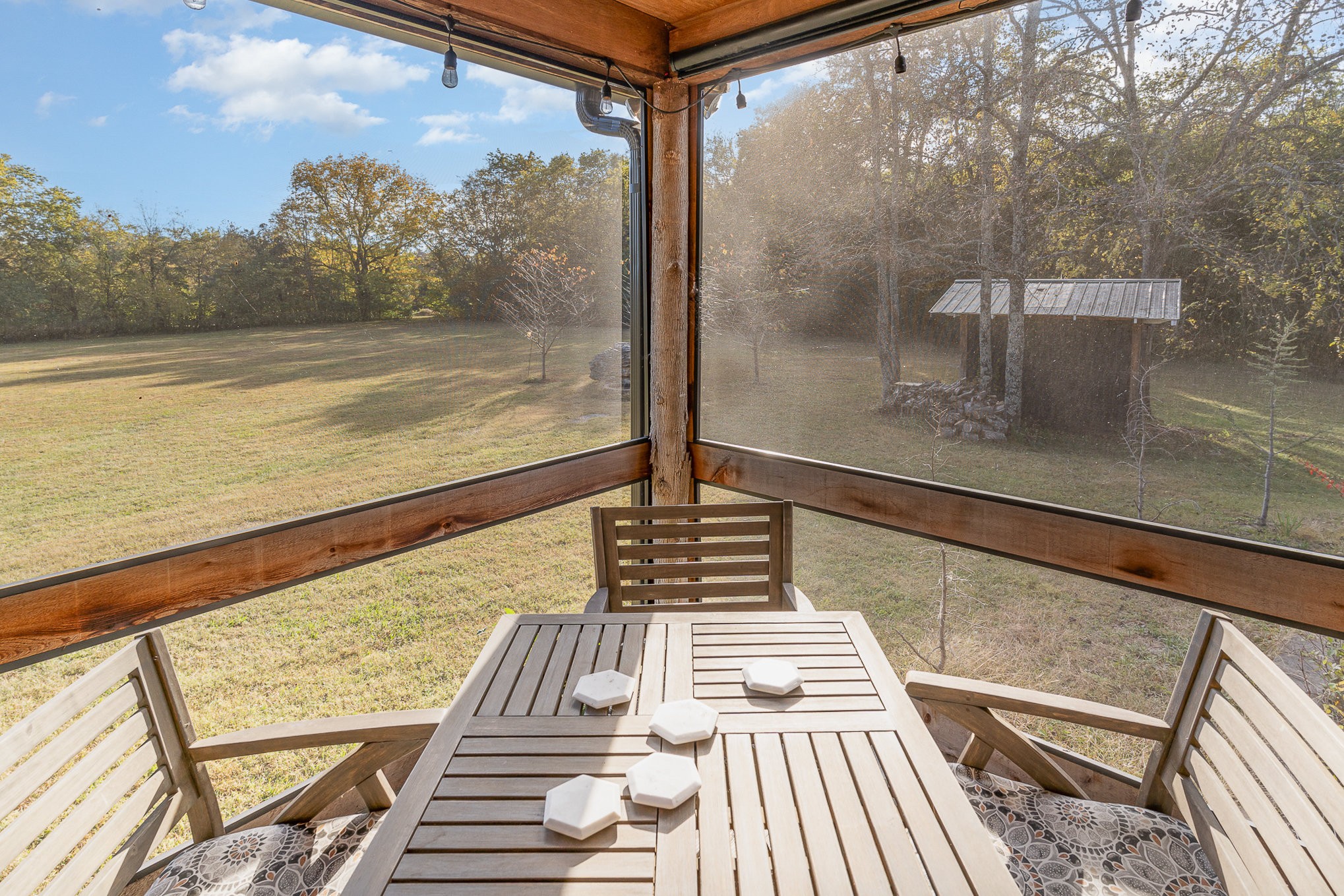 2065 Patterson Cemetery Road Chapel Hill, TN 37034 - Photo 28 of 39 a view of a balcony with floor to ceiling windows with wooden floor