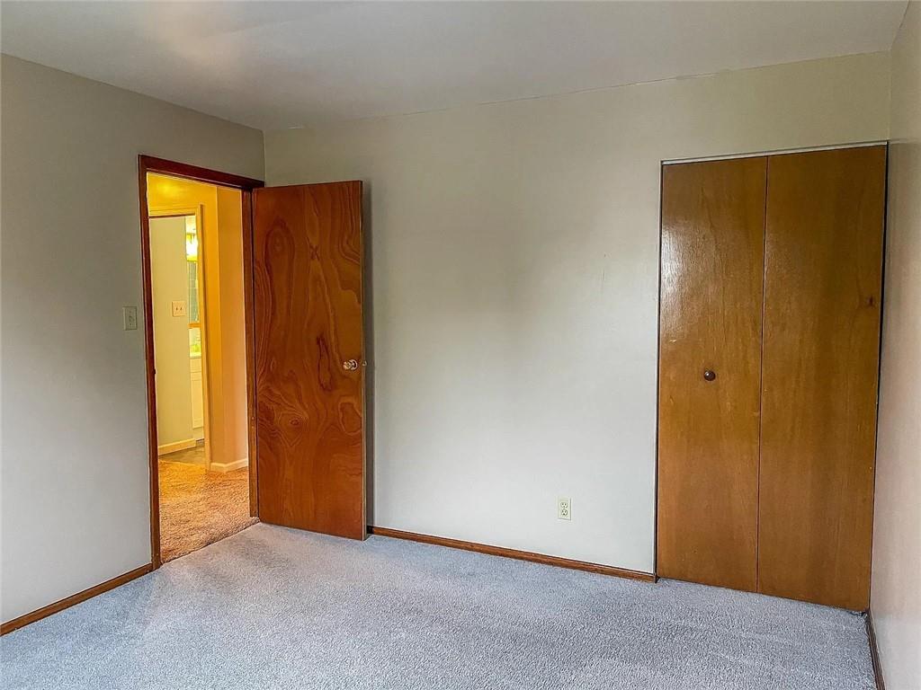 108 Whitney Drive Cranberry Township, PA 16066 - Photo 13 of 22 an empty room with windows and closet