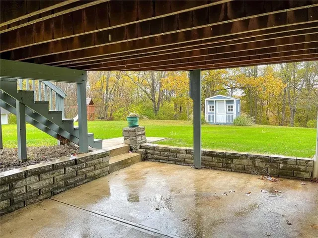 a view of a porch with a backyard