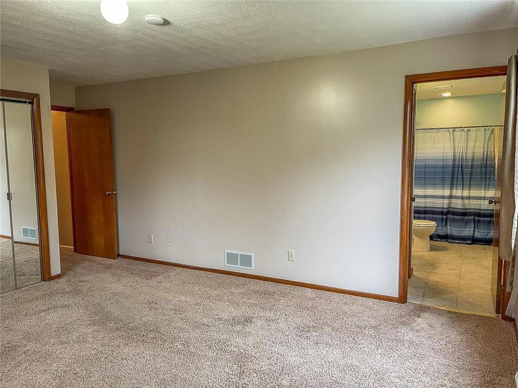 108 Whitney Drive Cranberry Township, PA 16066 - Photo 9 of 22 an empty room with mirror