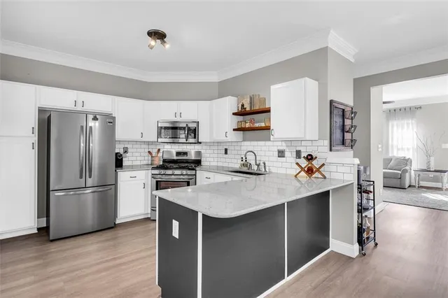 $325,000 | 5990 Eagle Tiff Lane Northeast, Sugar Hill, GA 30518