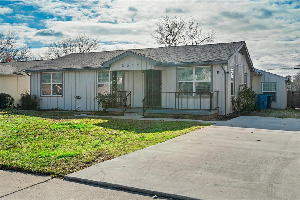 3514 Larry Street Rowlett, TX 75088 - Photo 24 of 27 a front view of a house with garden