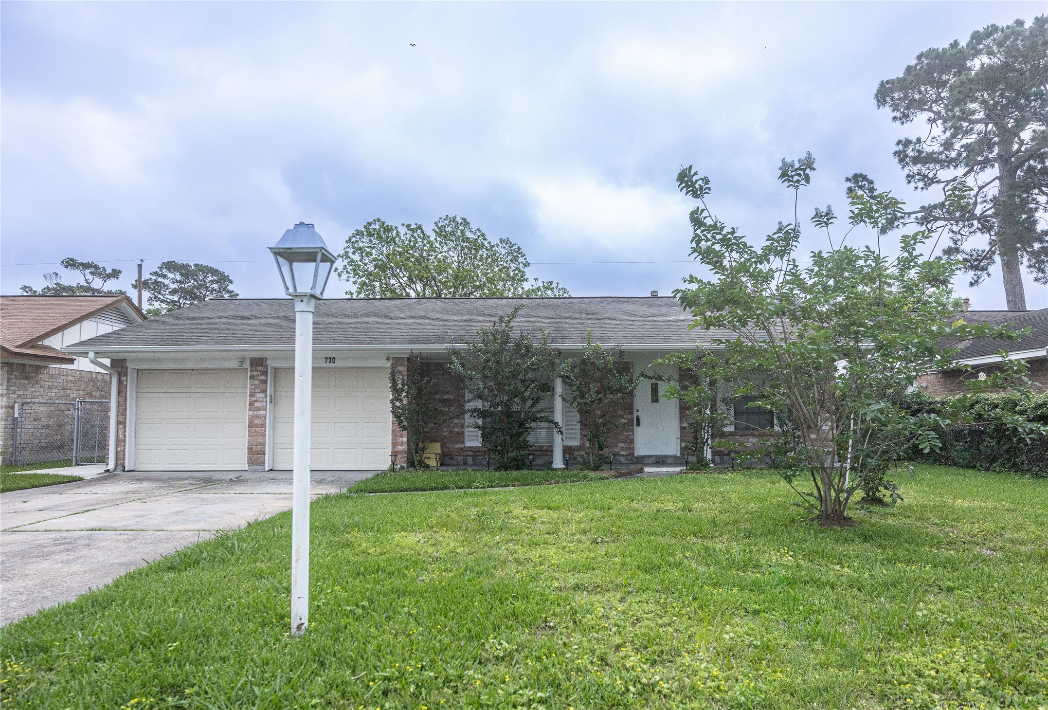 730 Barnesville Street Channelview, TX 77530 - Photo 1 of 7 front view of a house with a yard