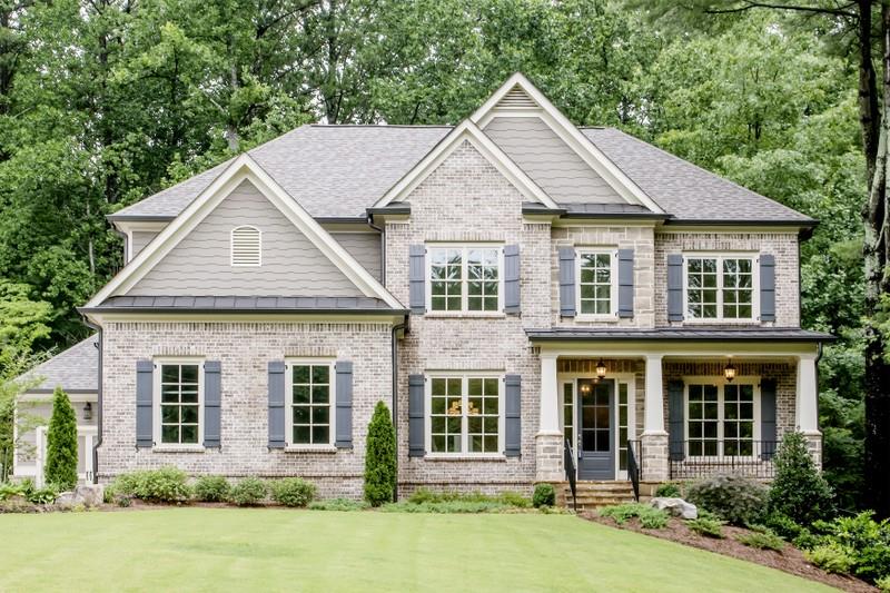 front view of a house with a yard