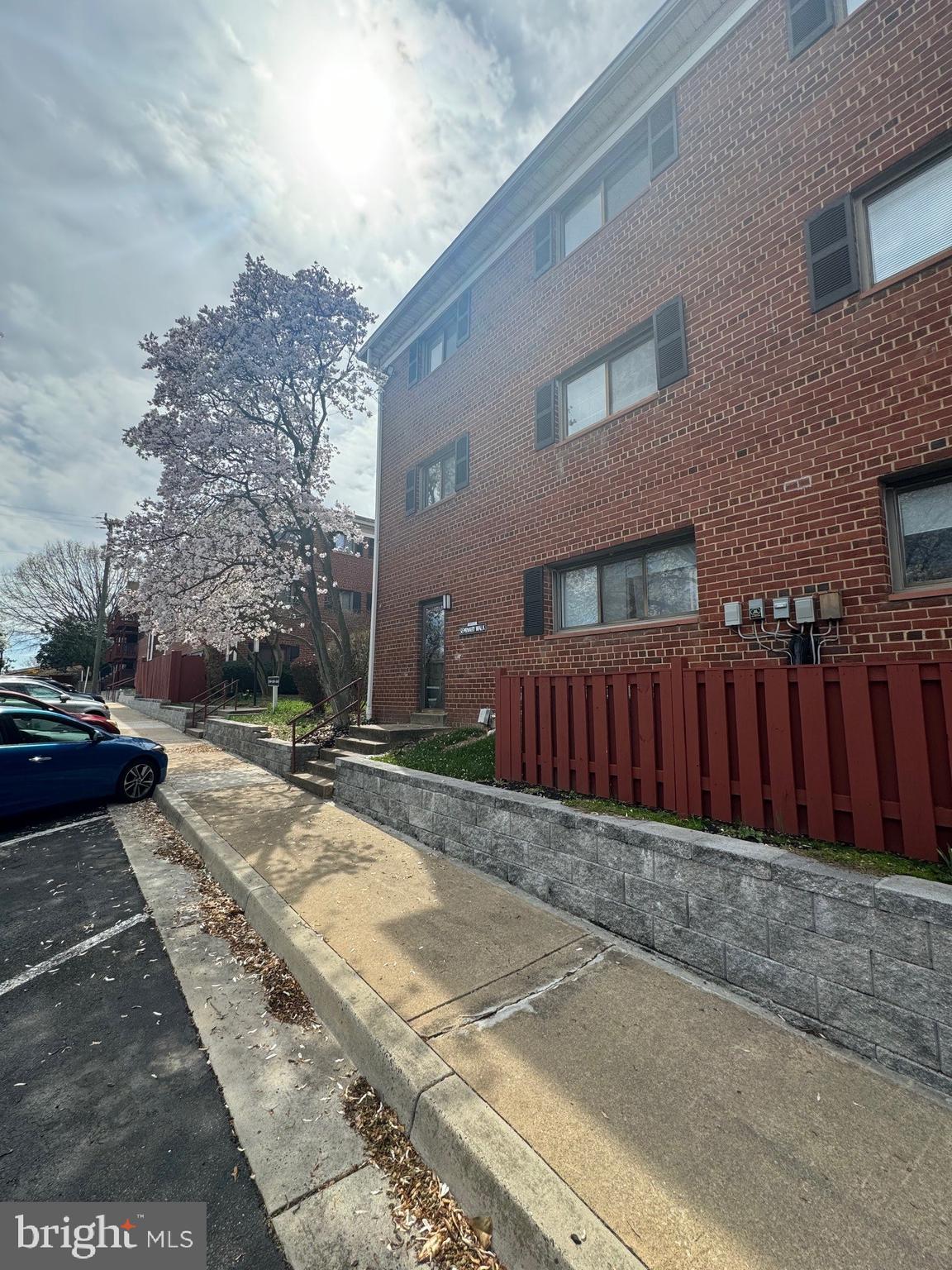 208 Skyhill Road, Unit 10 Alexandria, VA 22314 - Photo 25 of 26 a view of a backyard with pathway
