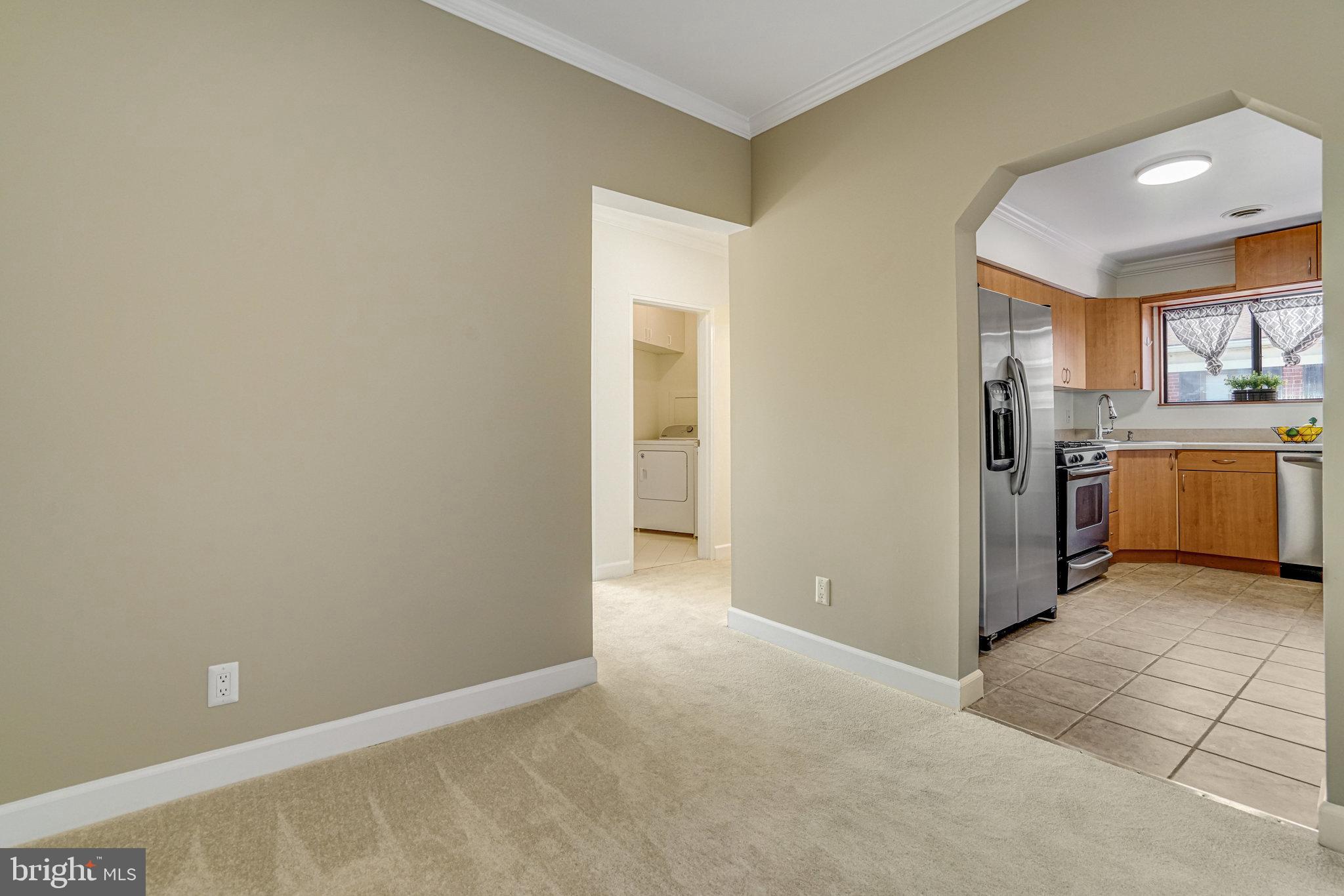 208 Skyhill Road, Unit 10 Alexandria, VA 22314 - Photo 10 of 26 a view of a kitchen with a sink
