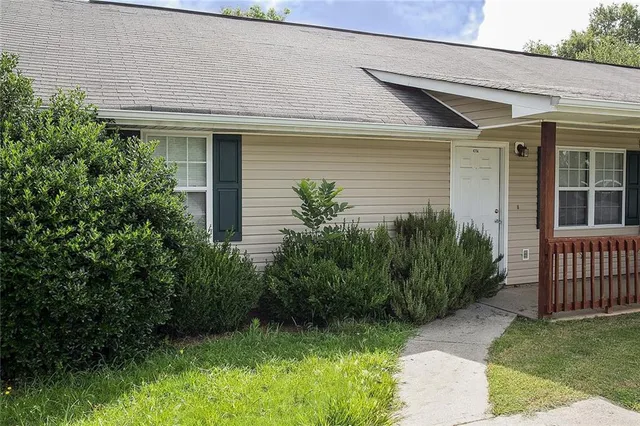 a view of a backyard with plants