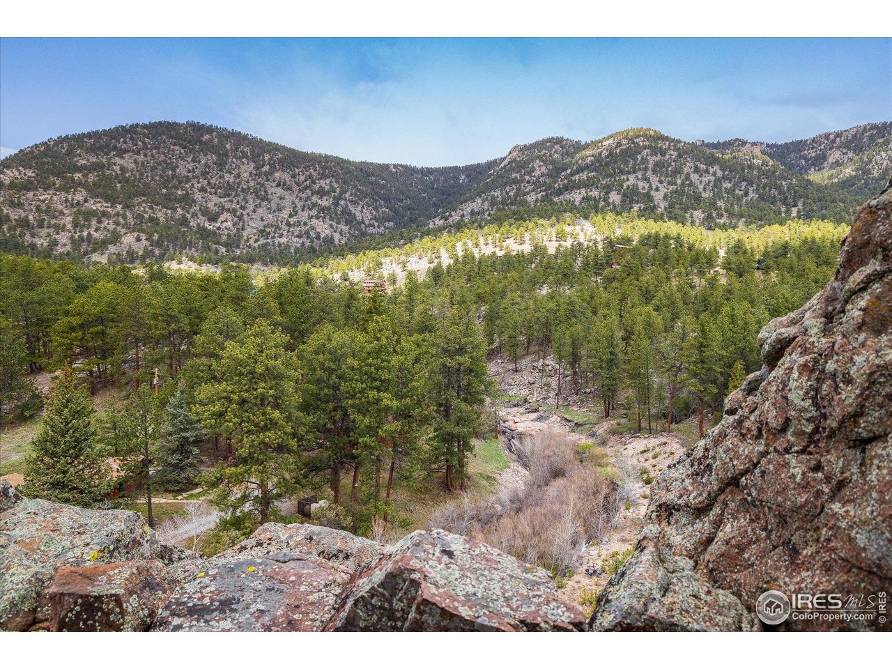 1289 Kiowa Road Lyons, CO 80540 - Photo 1 of 37 a view of a mountain