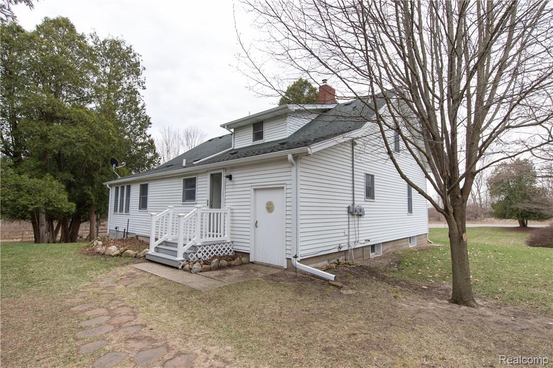 5826 Mt Morris Road Columbiaville, MI 48421 - Photo 10 of 42 back view of house.jpg