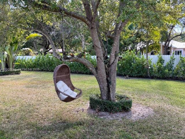7830 Southwest 117th Street Pinecrest, FL 33156 - Photo 23 of 26 a view of a garden with a tree