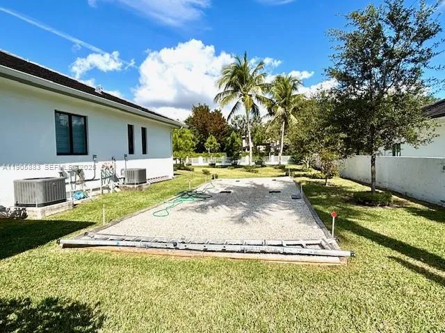 a view of a house with swimming pool