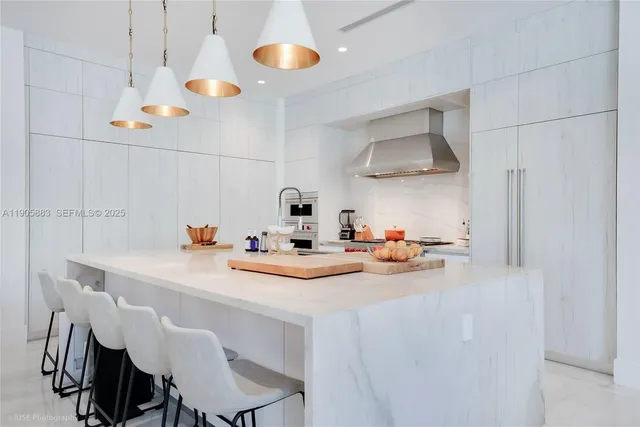 a view of a dining table and chairs in the kitchen