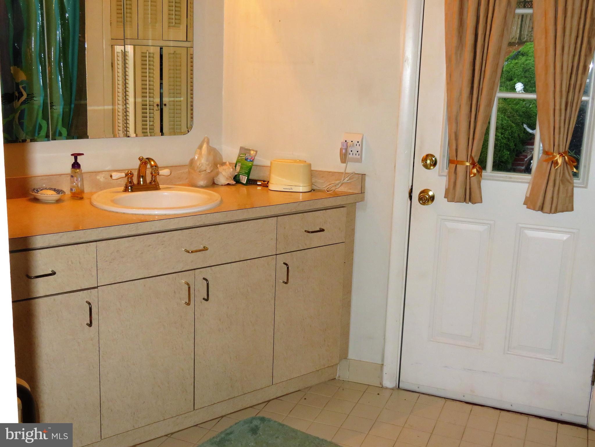 7318 Riverhill Road Oxon Hill, MD 20745 - Photo 11 of 19 Hall bath