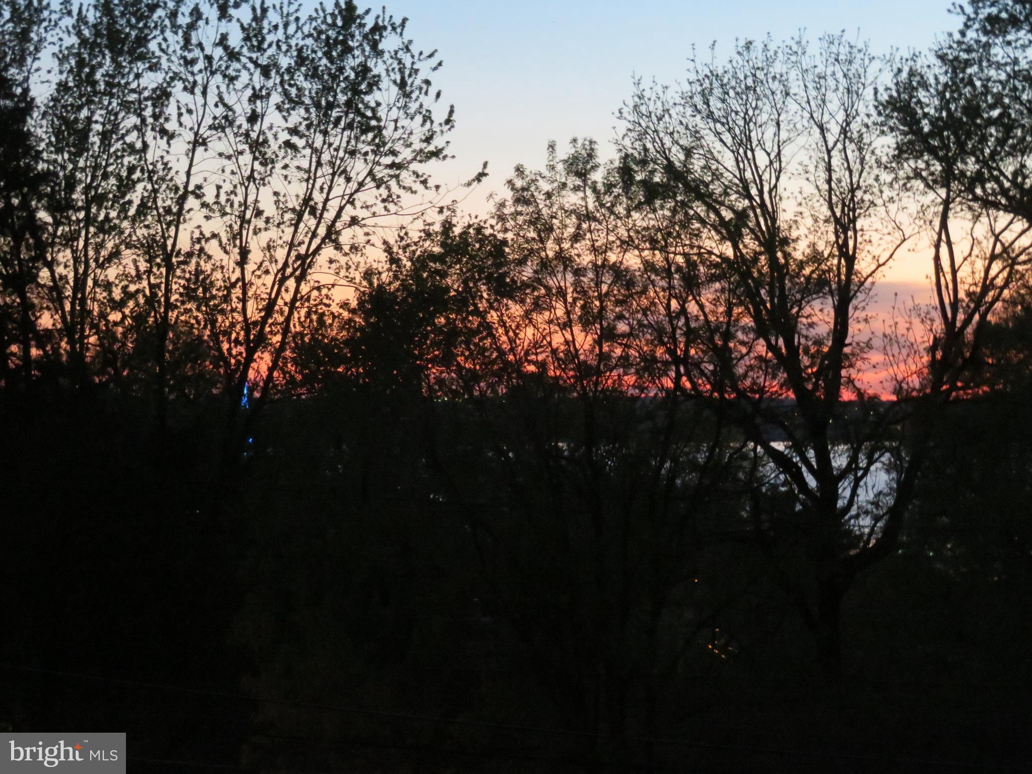 7318 Riverhill Road Oxon Hill, MD 20745 - Photo 16 of 19 Sunset river view from balcony