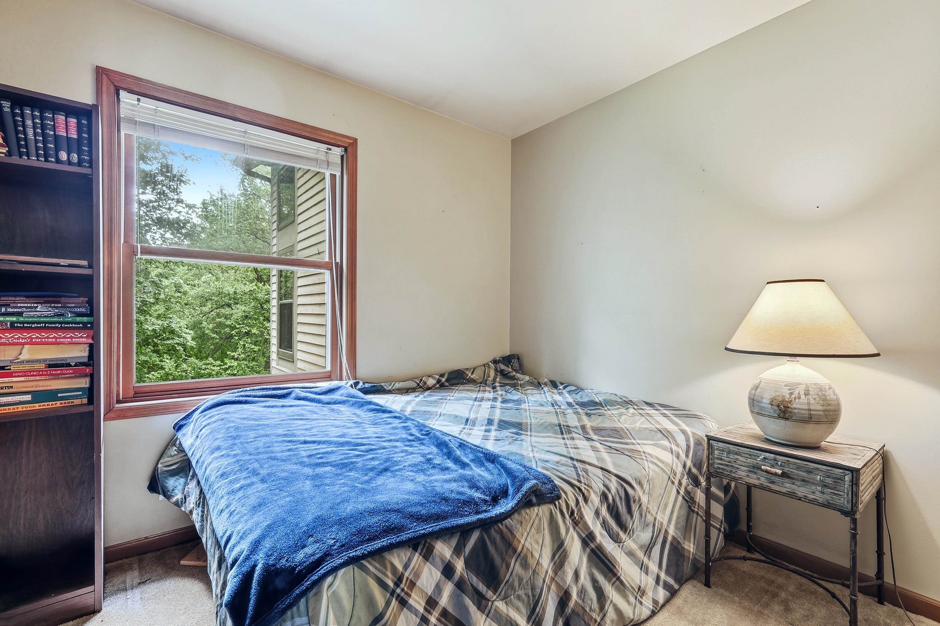 13 Signal Point Lane Galena, IL 61036 - Photo 10 of 47 a bedroom with a bed and a window