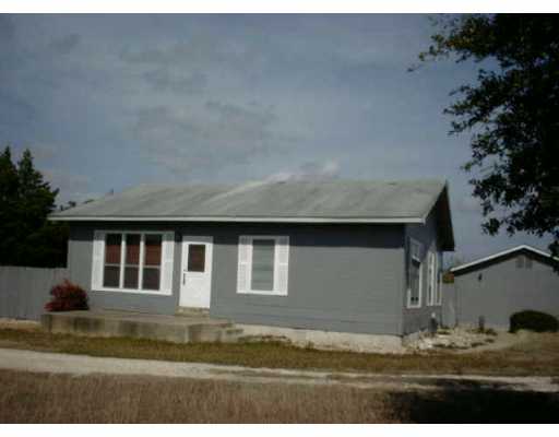 19412 Blake Manor Road Manor, TX 78653 - Photo 1 of 1 a view of back yard of the house