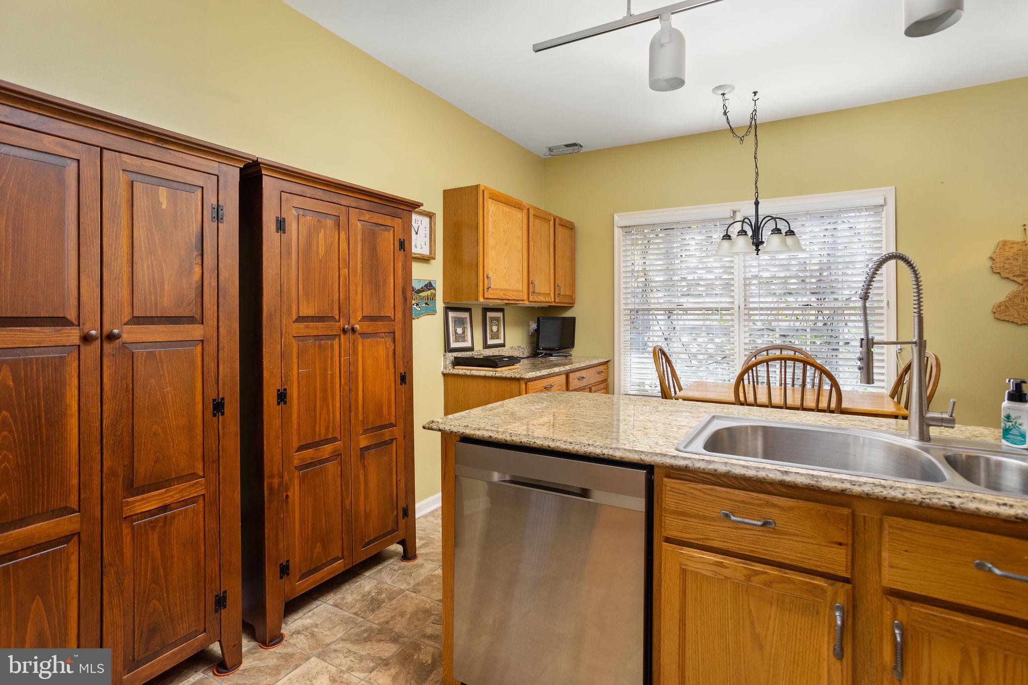 4 Lantern Lane Columbus, NJ 08022 - Photo 19 of 46 a kitchen with sink refrigerator and window