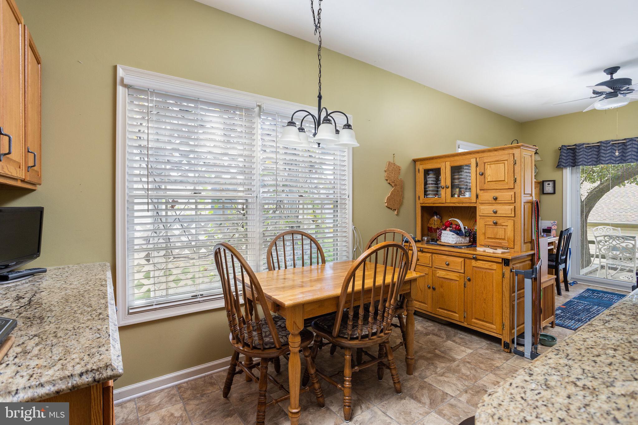 4 Lantern Lane Columbus, NJ 08022 - Photo 22 of 46 a dining room with furniture and window