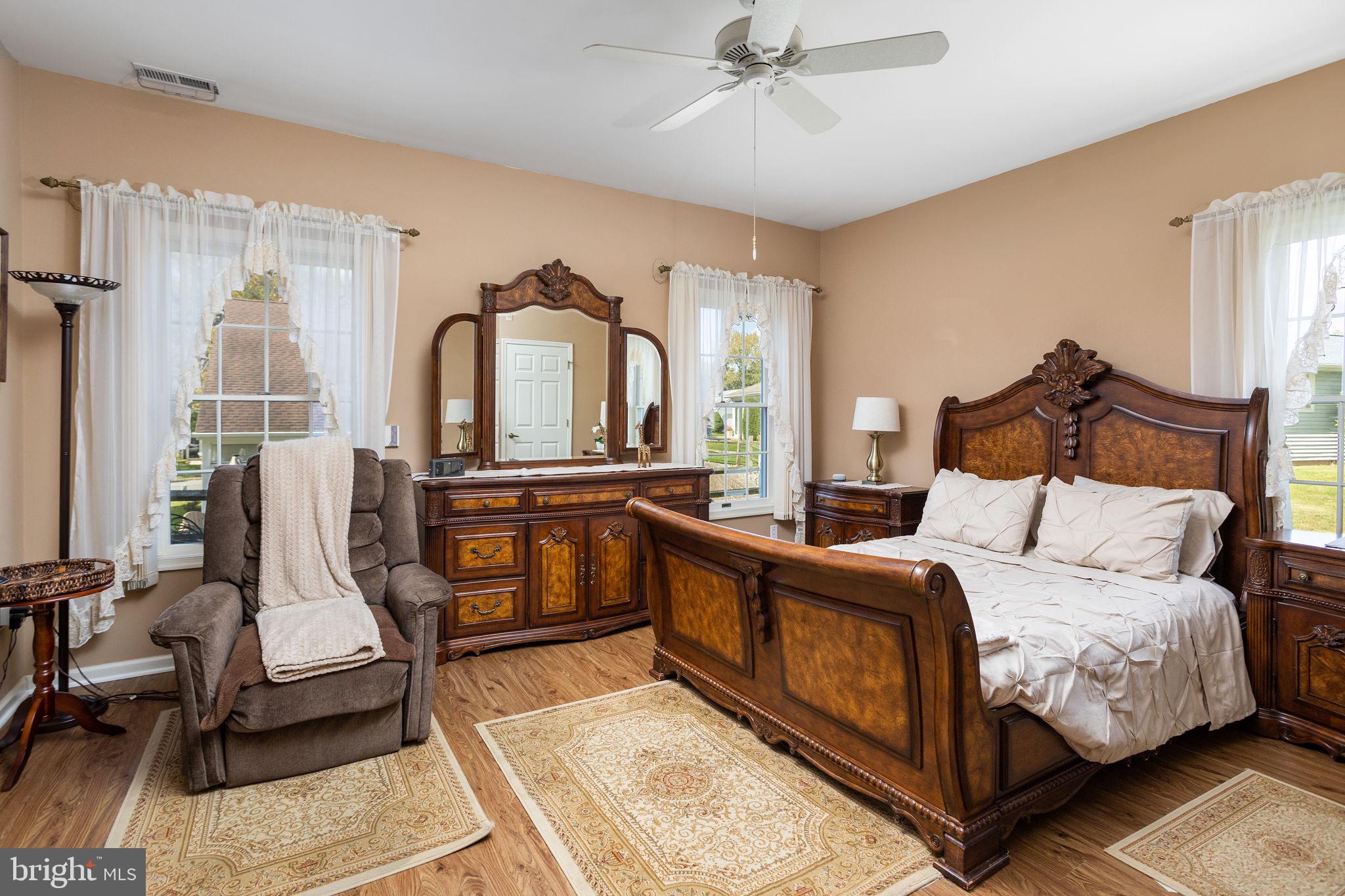 4 Lantern Lane Columbus, NJ 08022 - Photo 31 of 46 a bedroom with a bed a couch and dresser