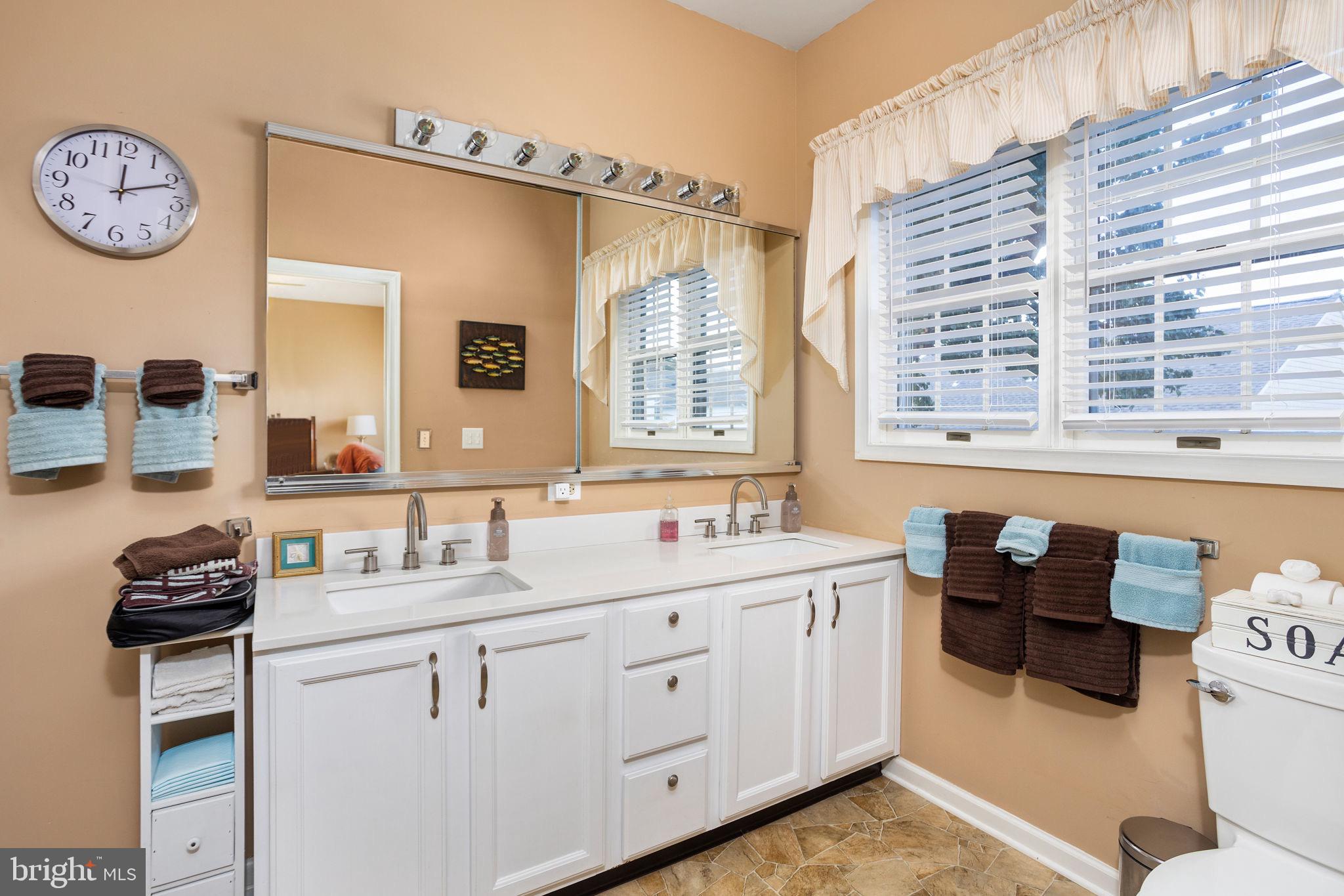 4 Lantern Lane Columbus, NJ 08022 - Photo 33 of 46 a bathroom with a sink and a mirror