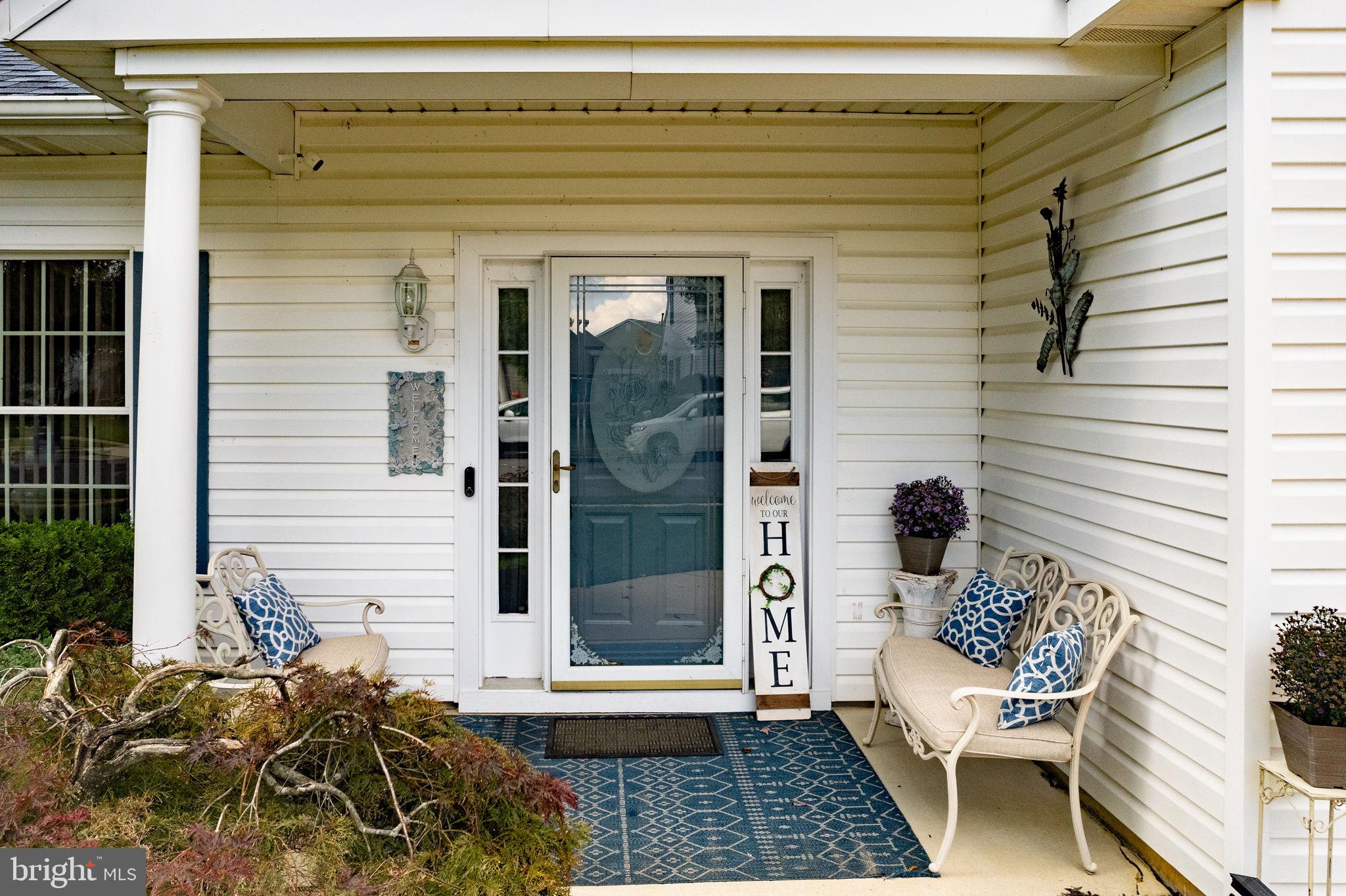 4 Lantern Lane Columbus, NJ 08022 - Photo 8 of 46 a view of a balcony with chair and wooden floor