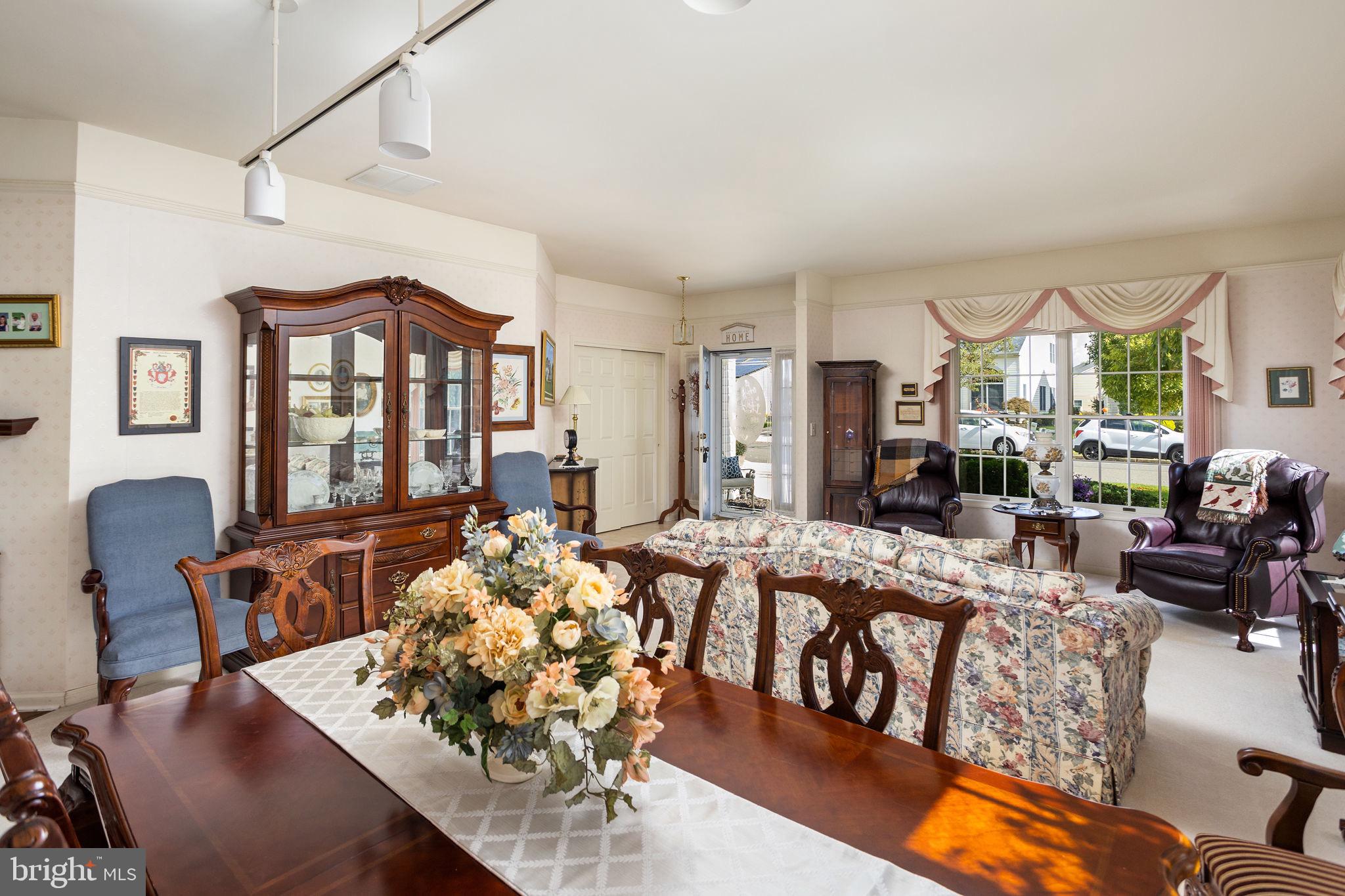 4 Lantern Lane Columbus, NJ 08022 - Photo 9 of 46 a view of a dining room with furniture window and wooden floor