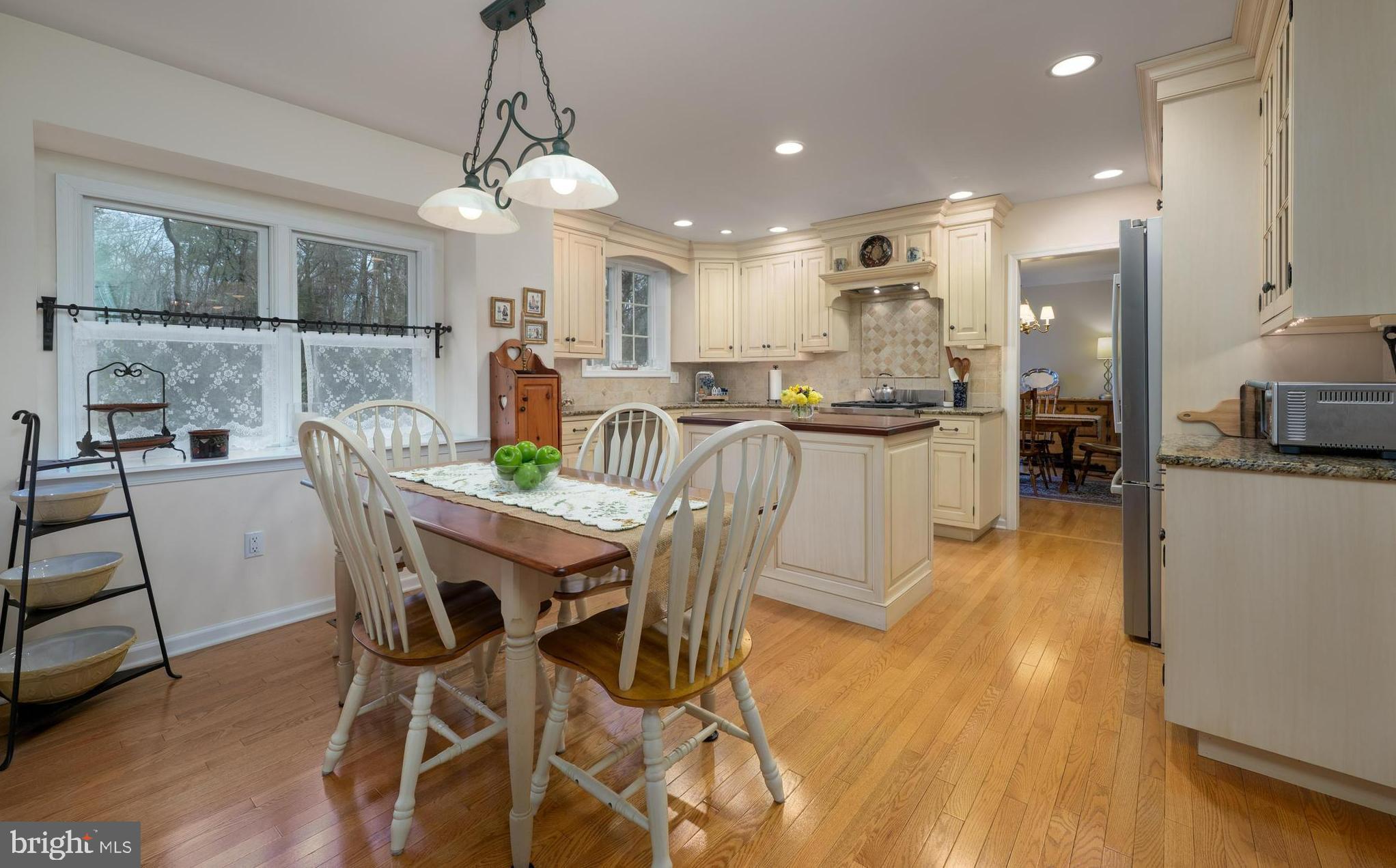 1 Strafford Circle Road Medford, NJ 08055 - Photo 11 of 31 a view of a dining room and livingroom with furniture wooden floor a chandelier