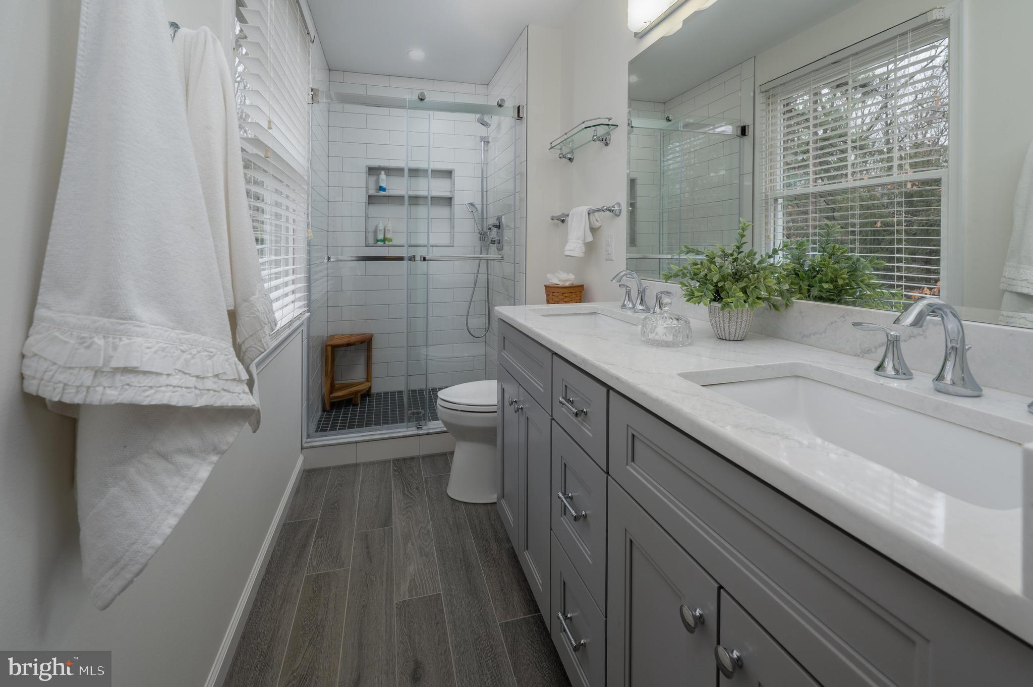 1 Strafford Circle Road Medford, NJ 08055 - Photo 19 of 31 a bathroom with a sink a toilet and shower