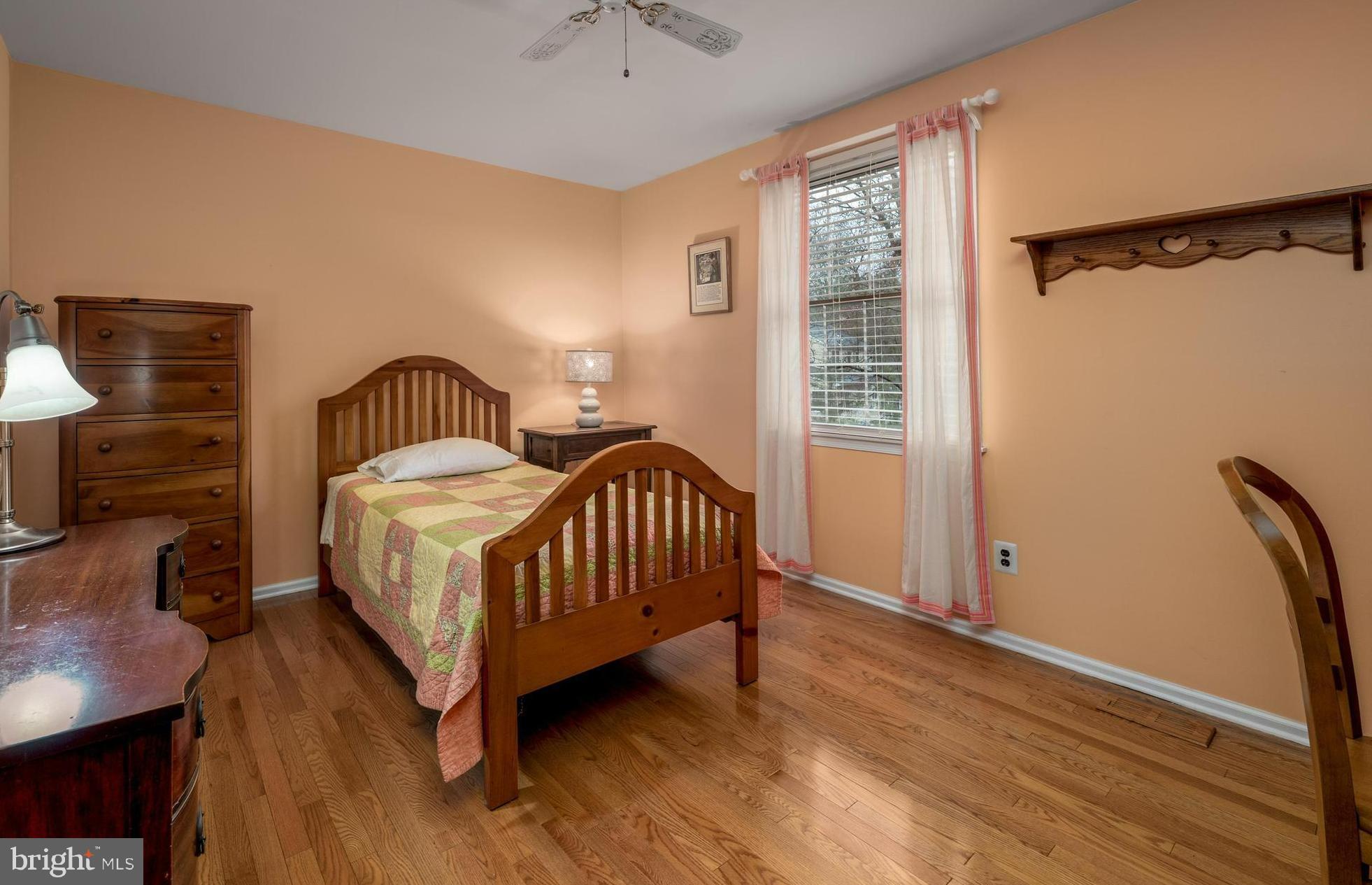 1 Strafford Circle Road Medford, NJ 08055 - Photo 24 of 31 a bedroom with a bed and wooden floor