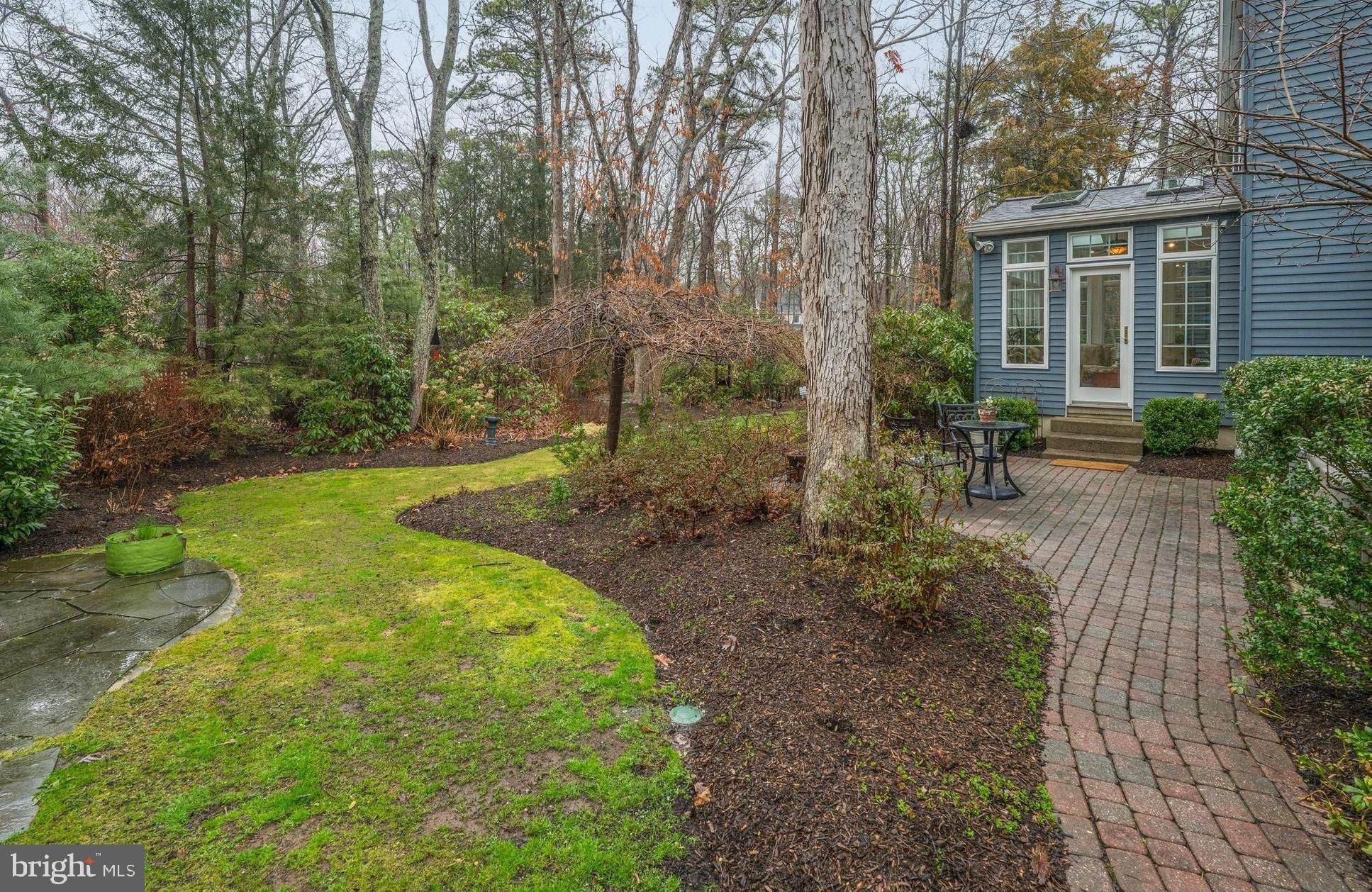 1 Strafford Circle Road Medford, NJ 08055 - Photo 25 of 31 a view of backyard with outdoor seating and green space